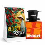 Phinist coffee package with a person and coffee beans, and a black coffee filter on an orange box.