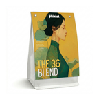 Coffee bag with a design of a woman's profile and 'The 36 Blend' text on a yellow background